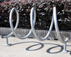 Estante de bicicleta de soporte de ciclo de metal de acero inoxidable en forma de espiral para estacionamiento